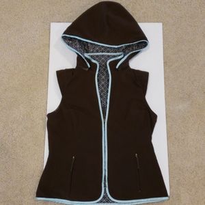 Reversible wind proof, hooded vest